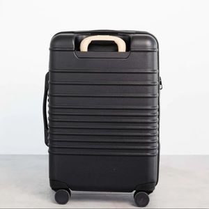 Beis Carry-On Roller luggage in black